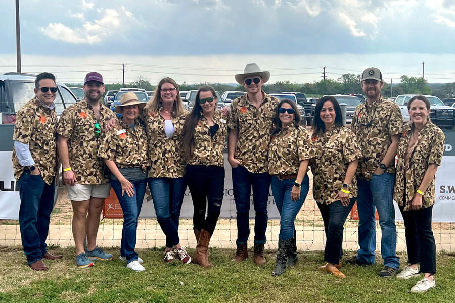 DSEF members smiling at Clays for Classroom event